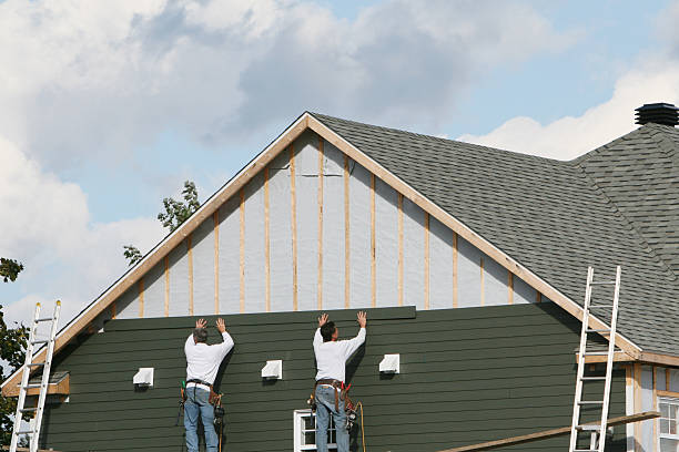 Professional Siding Replacement technician working in Newbury, OH